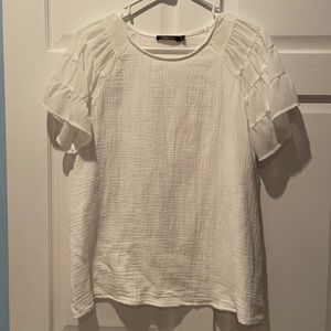 White flutter sleeve blouse